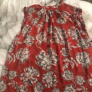 Sleeveless turtle neck blouse